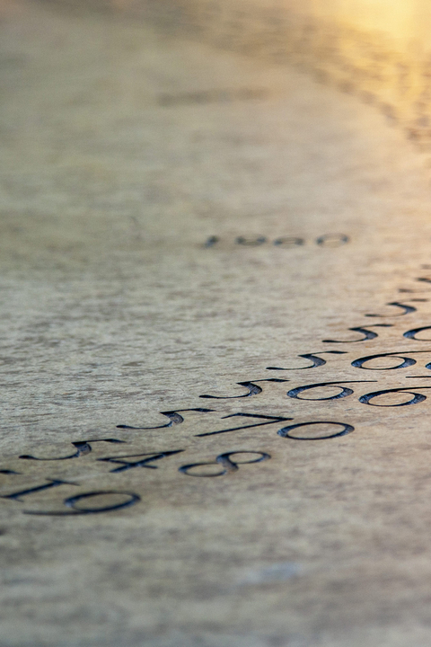 Detail of numbers carved into Maya Lin's Women's Table sculpture